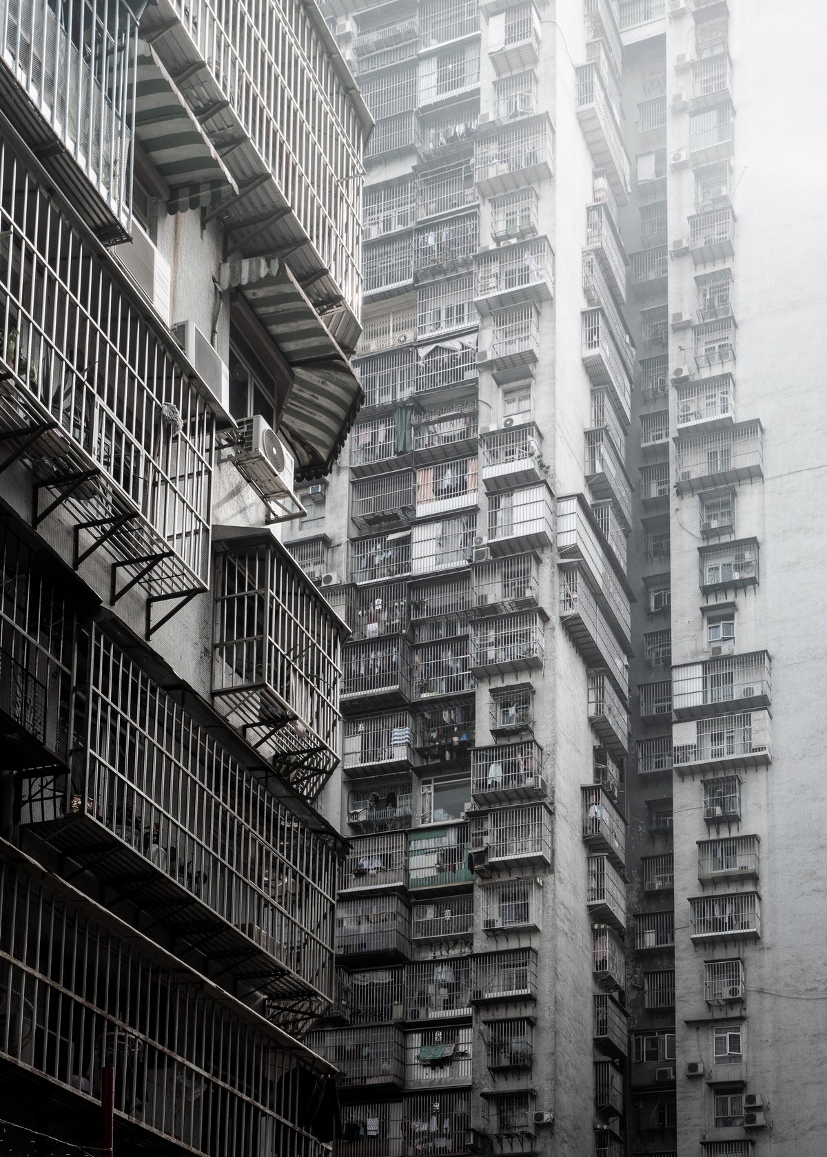 Macau 3 poster, zwart-wit foto van woontorens in Macau